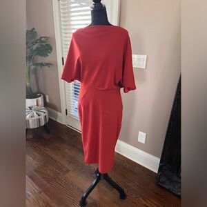 Women’s sheath off the shoulder dress.